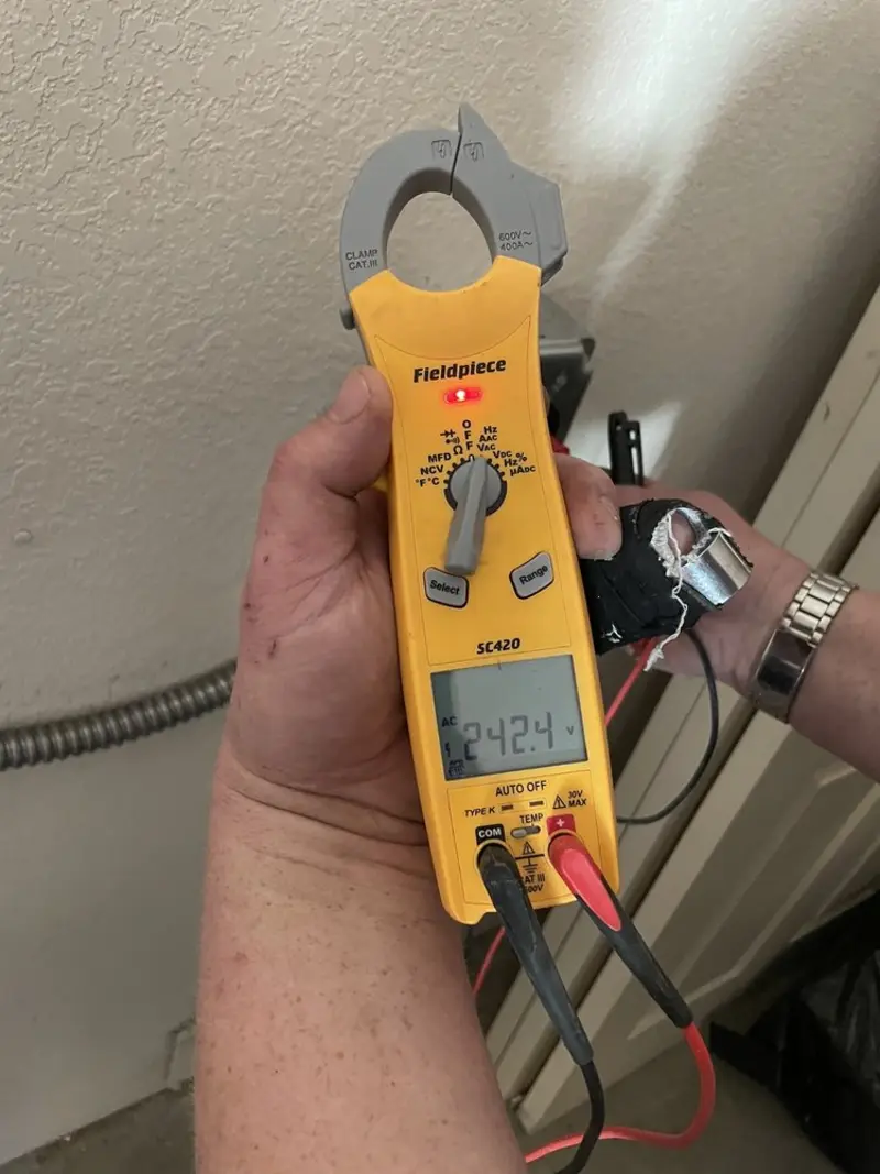 Voltage testing with clamp meter during Generator Installation in Lamar